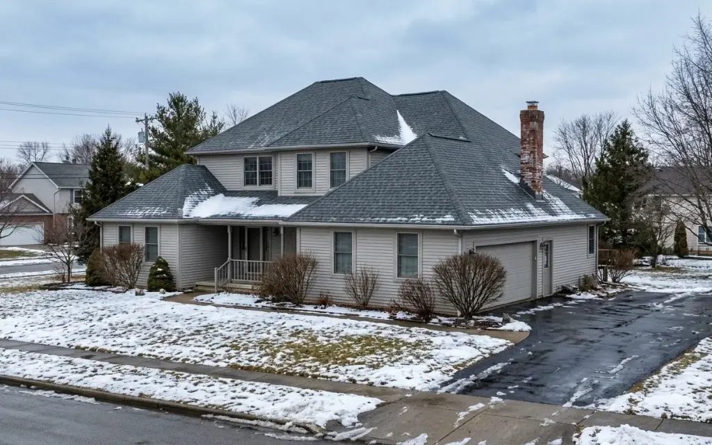 Best Roofing Materials for Toledo Weather Conditions 2 A variety of roofing materials including asphalt shingles, metal, and slate suitable for Toledo homes, provided by Roofing419®