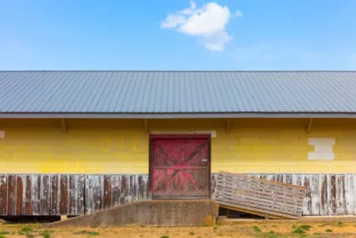 Barn with a professionally installed metal roof by Roofing419.