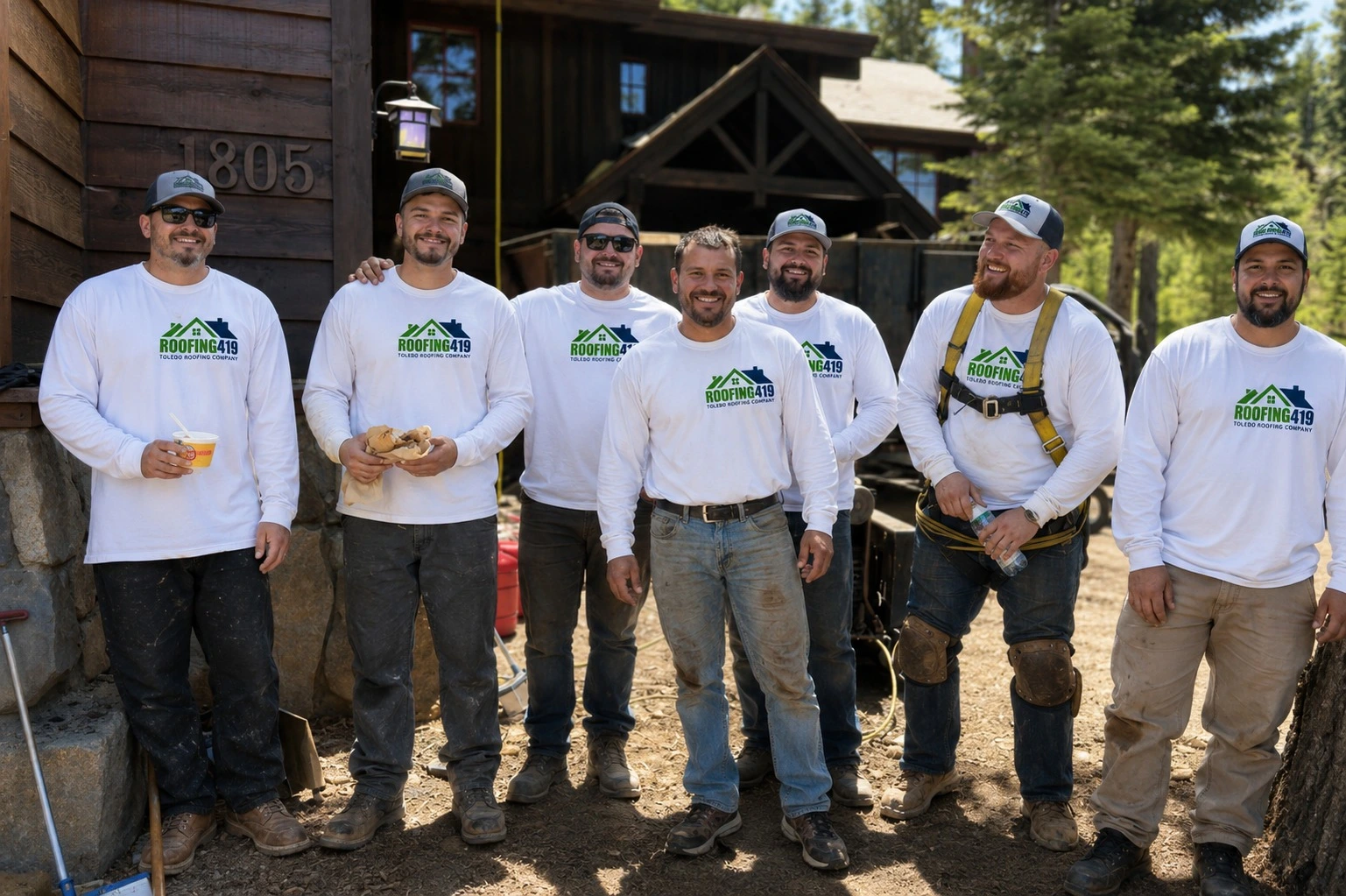 Toledo Roofing Company | Roofing Contractors Toledo Ohio | Roofing419 45 Six Roofing419 team members standing together outside a residential property during a roofing project.