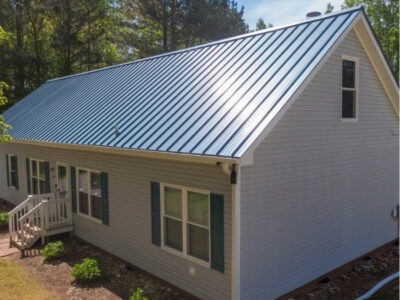 Ann Arbor MI 42 Front view of a home with a new blue metal roof installed in Ann Arbor, Michigan