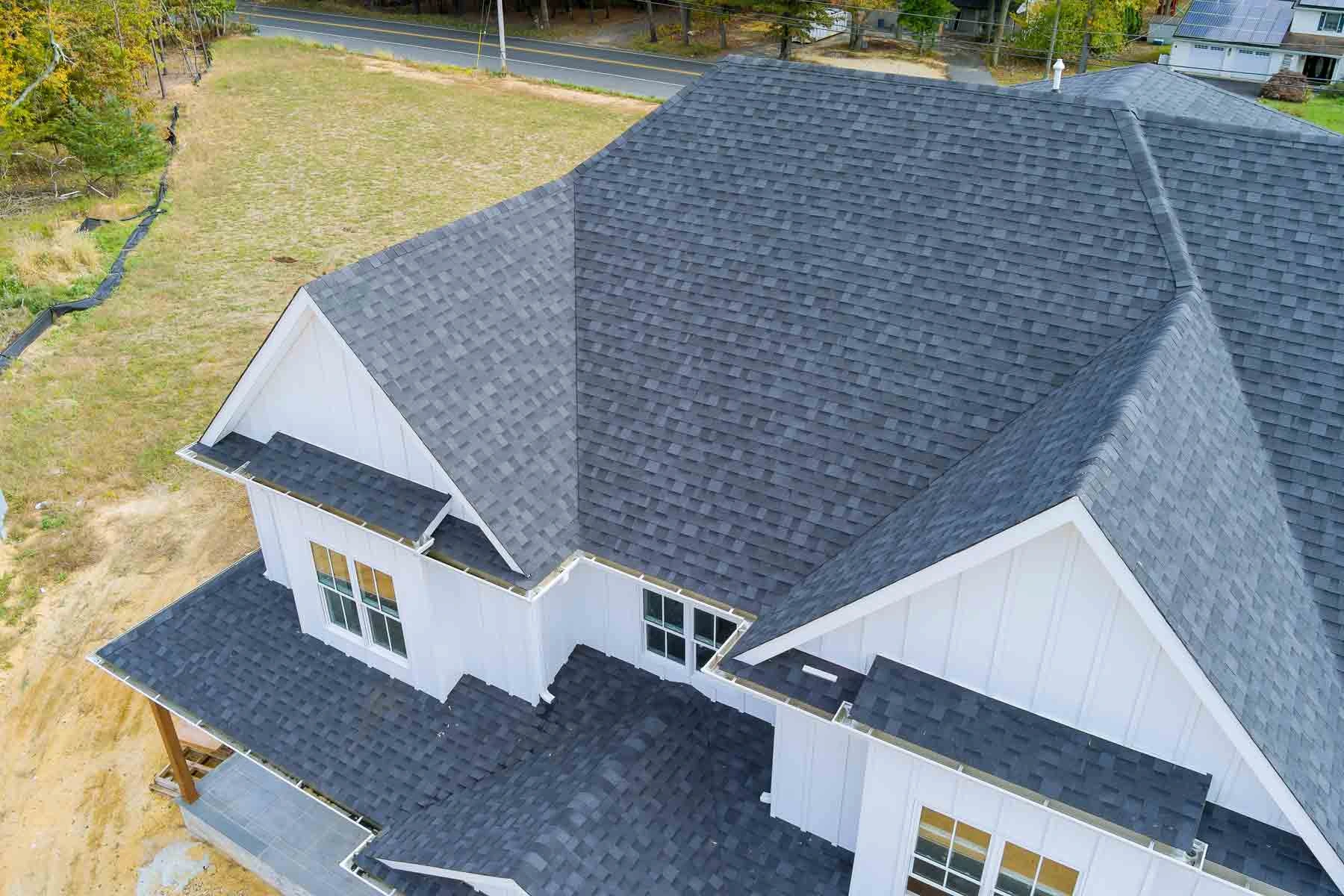 Adrian MI 35 Aerial view of a completed asphalt shingle roof on a new construction home in Adrian, Michigan