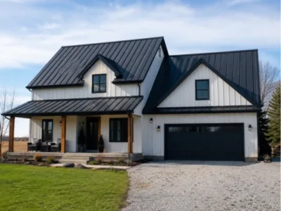 Adrian MI 41 Front view of a modern farmhouse with a new black standing seam metal roof in Adrian, Michigan