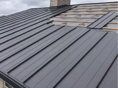 Adrian MI 42 Metal roof installation in progress on a home in Adrian, Michigan